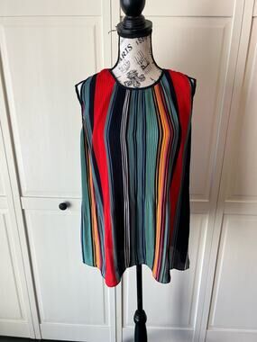 Dalia multi colored striped peplum hem tank top blouse